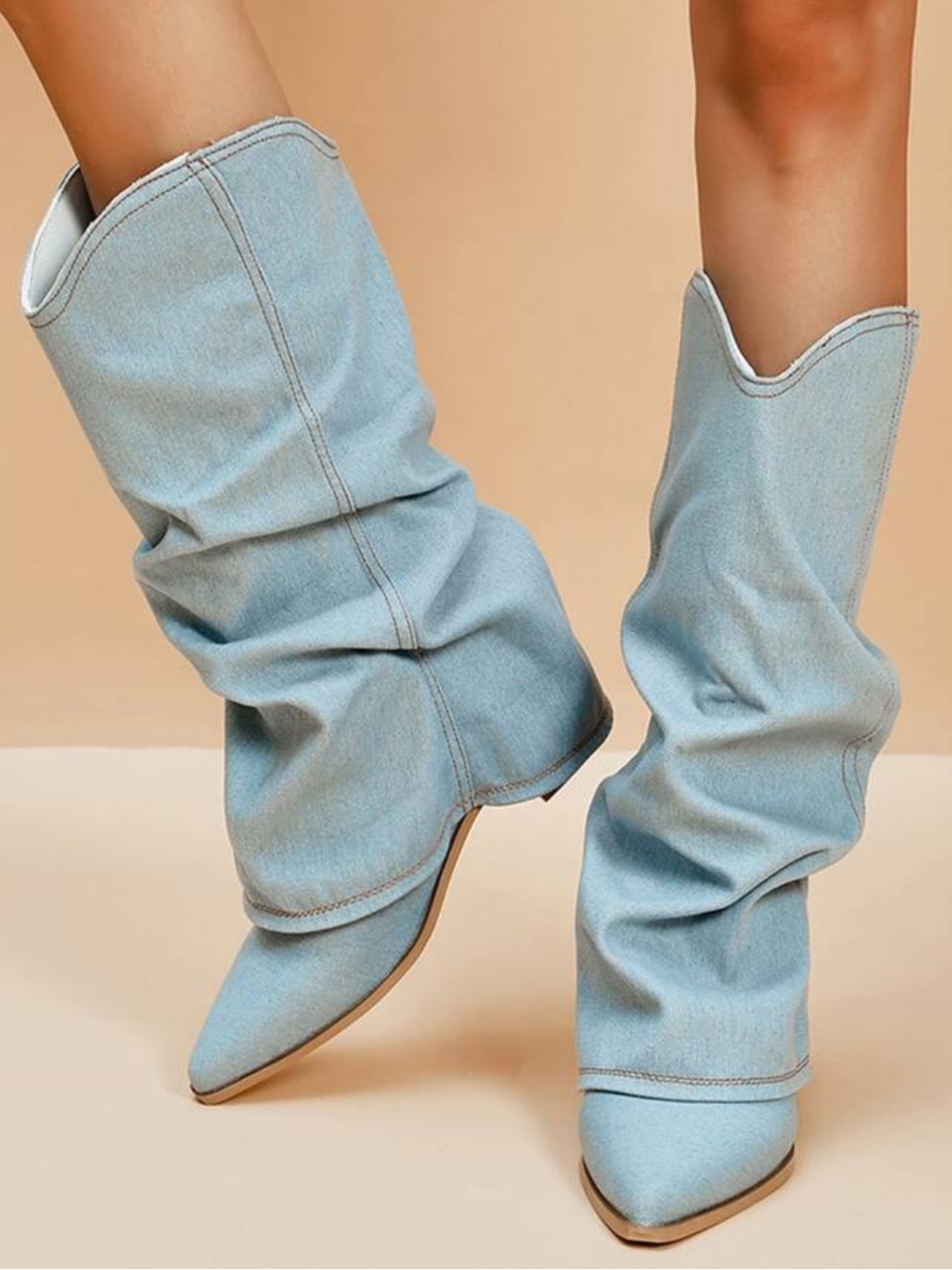 Slouchy Knee-High Pointed-Toe Boots in Light Blue Denim